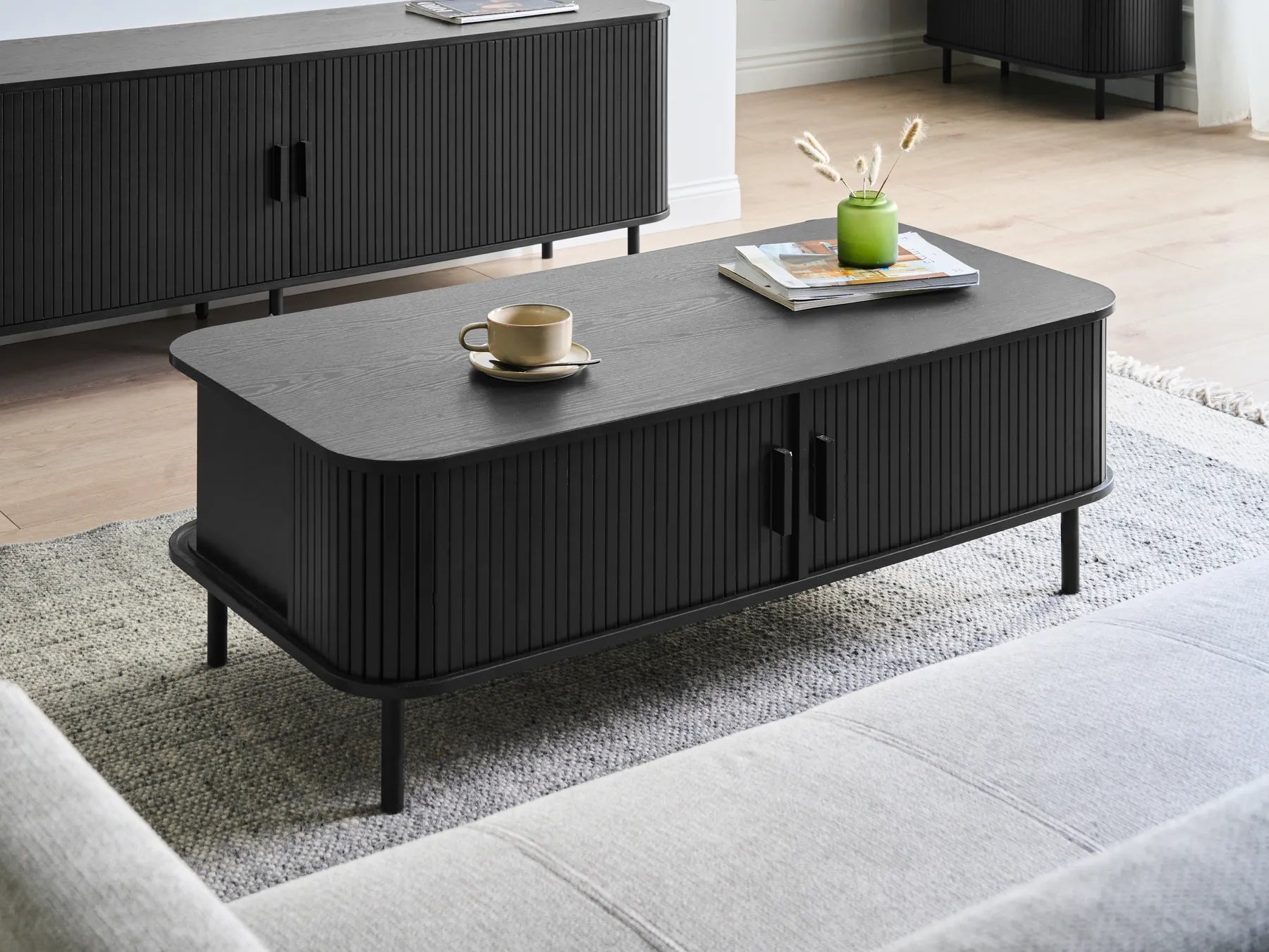 Bradley Black Coffee Table with Sliding Doors, MDF & Pine Wood