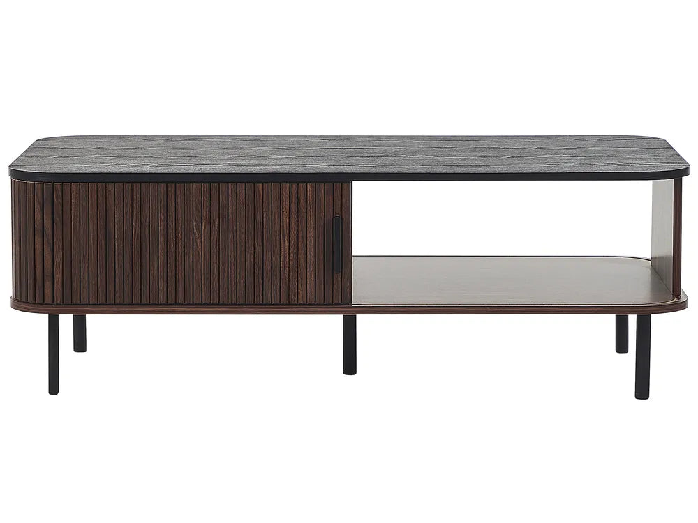 The JOSE dark brown coffee table is a rectangular coffee table with built-in storage, designed for modern living rooms. It features sliding doors that provide easy access to concealed storage compartments, as well as two open shelves for everyday items.